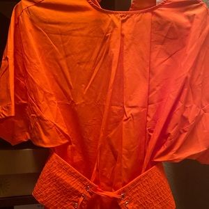 Orange corset like blouse